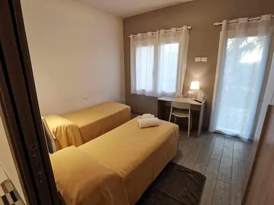 Letto o letti in una camera di Casa Belfiore Vicenza Martiri di Belfiore 23