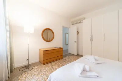 Letto o letti in una camera di San MArtino Apartment