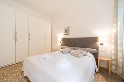 Letto o letti in una camera di San MArtino Apartment