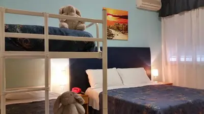 Letto o letti in una camera di Hotel Danubio