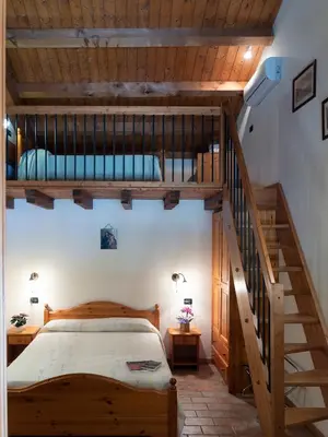 Letto o letti in una camera di Agriturismo Il Palazzone