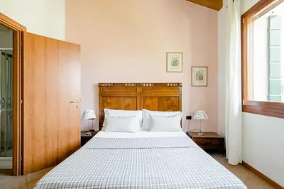 Letto o letti in una camera di Agriturismo Ai Carpini