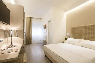 Letto o letti in una camera di Hotel Grottamare