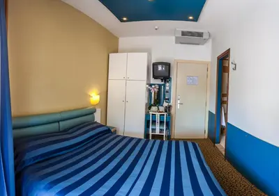 Letto o letti in una camera di Hotel Christian