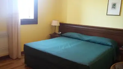 Letto o letti in una camera di Villa Del Poeta