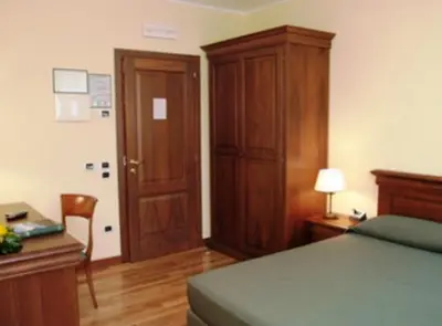 Letto o letti in una camera di Villa Del Poeta