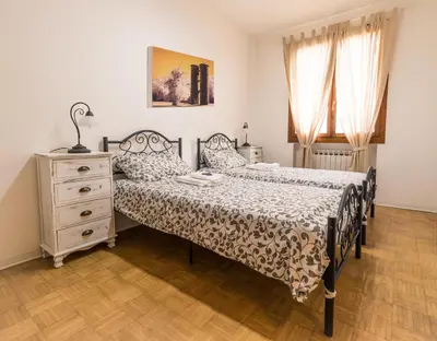Letto o letti in una camera di CaMagnolia Apartment