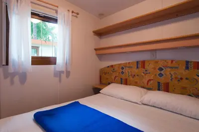 Letto o letti in una camera di Camping Village Cavallino