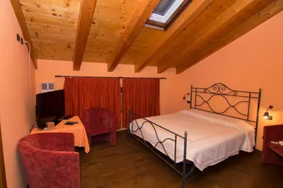 Letto o letti in una camera di Agriturismo I Marzemini