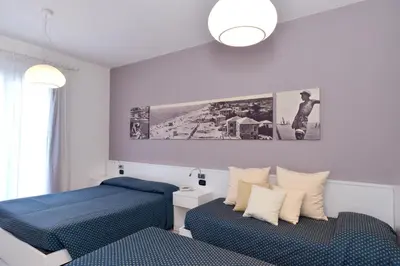 Letto o letti in una camera di Hotel & Residence Progresso