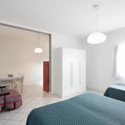 Letto o letti in una camera di Hotel & Residence Progresso