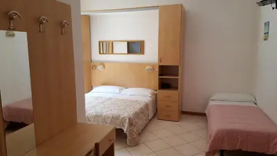 Letto o letti in una camera di Hotel Canova