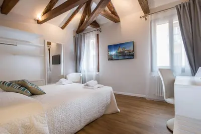 Letto o letti in una camera di Ca' Giusta