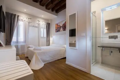 Letto o letti in una camera di Ca' Giusta