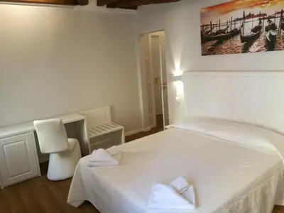 Letto o letti in una camera di Ca' Giusta