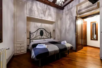 Letto o letti in una camera di Red Fashion