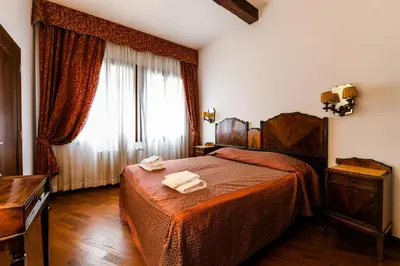 Letto o letti in una camera di Casetta Rossa