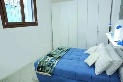 Letto o letti in una camera di Residenza Ca' Matta