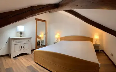 Letto o letti in una camera di Cà Bonivento