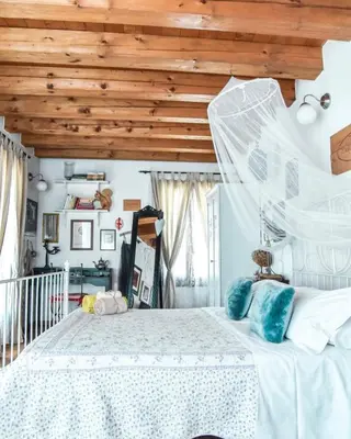 Letto o letti in una camera di Locanda San Tomaso