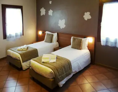 Letto o letti in una camera di Locanda Ai Archi Di Andreola Monica