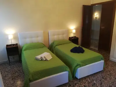 Letto o letti in una camera di Residenza Ca Trinità