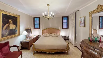 Letto o letti in una camera di Ca' Moro Murano