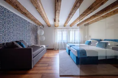 Letto o letti in una camera di Ca' Moro Lido