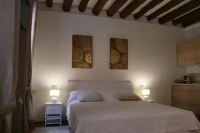 Letto o letti in una camera di Ca' del Cortile