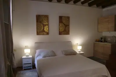 Letto o letti in una camera di Ca' del Cortile