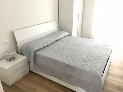 Letto o letti in una camera di DELTA A - Piazza Marina - Vista mare