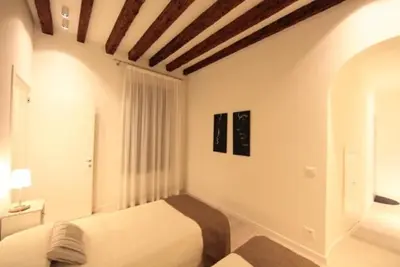 Letto o letti in una camera di San Marco White Apartment
