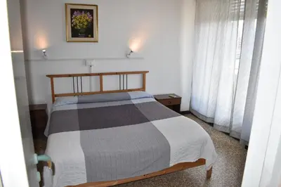 Letto o letti in una camera di Appartamento Paola