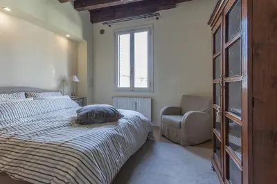 Letto o letti in una camera di Casa Tadi Padova Centro