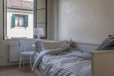 Letto o letti in una camera di Casa Tadi Padova Centro