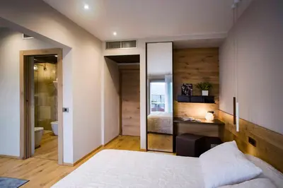 Letto o letti in una camera di Hotel Ristorante La Rosina