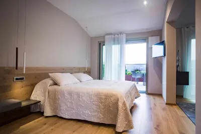 Letto o letti in una camera di Hotel Ristorante La Rosina