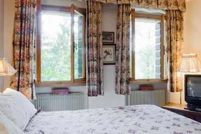 Letto o letti in una camera di Villa La Cimetta Asolo