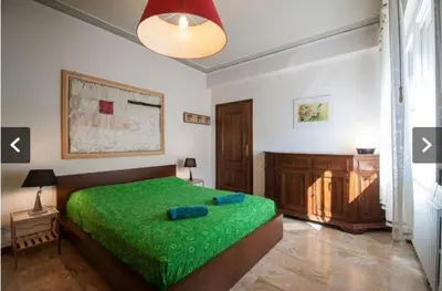 Letto o letti in una camera di Casa Murazzi