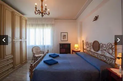 Letto o letti in una camera di Casa Murazzi