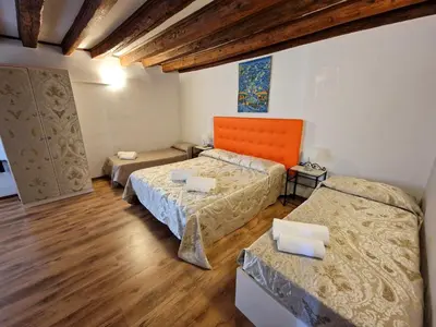 Letto o letti in una camera di Ca Miracoli