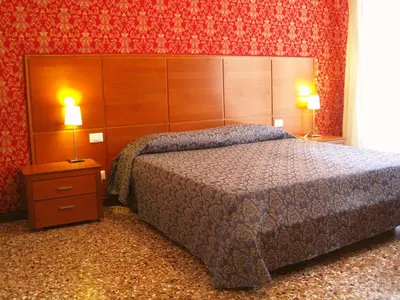Letto o letti in una camera di Casa Dolce
