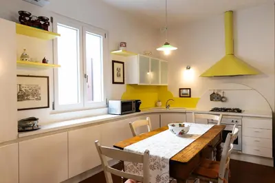 Cucina o angolo cottura di Dimora storica, appartamento in Villa Pampinuccia