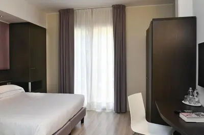 Letto o letti in una camera di Hotel Vienna