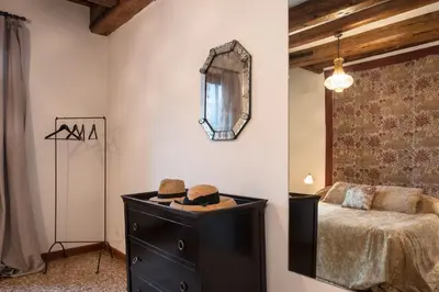 Letto o letti in una camera di Ca' Navagero Apartments