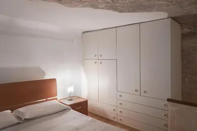 Letto o letti in una camera di Melusina Fresco Venice Historical Center