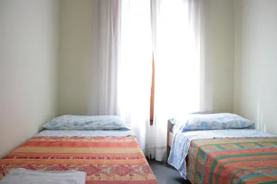 Letto o letti in una camera di Melusina Bocca di Piazza Venice Historical Center