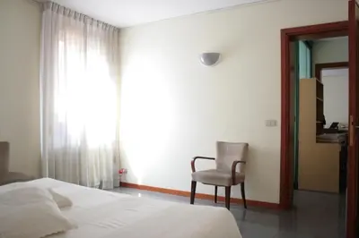 Letto o letti in una camera di Melusina Bocca di Piazza Venice Historical Center