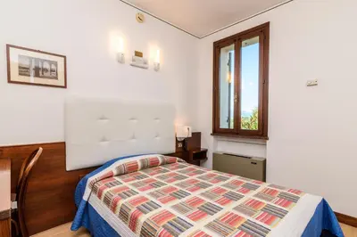 Letto o letti in una camera di Hotel San Marco