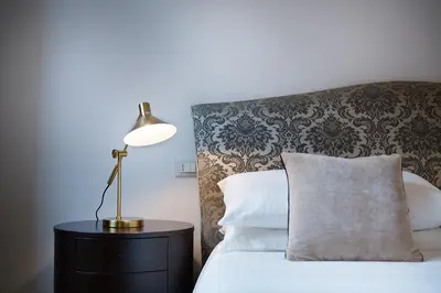 Letto o letti in una camera di Suite Veronica & Maison Laguna